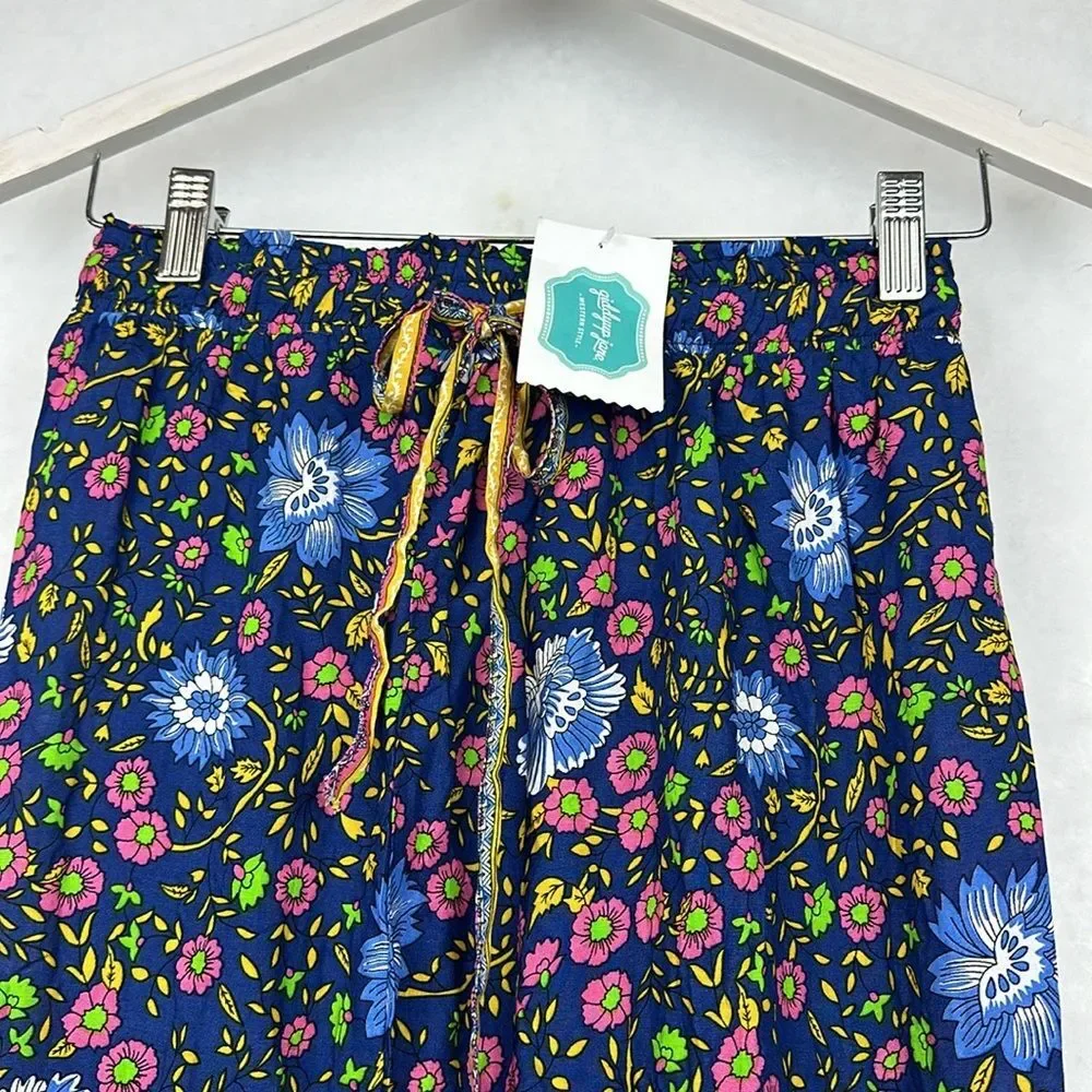 NWT Aly Daly Naxi Skirt Floral Print Navy background, pink/Yellow flower Sz S